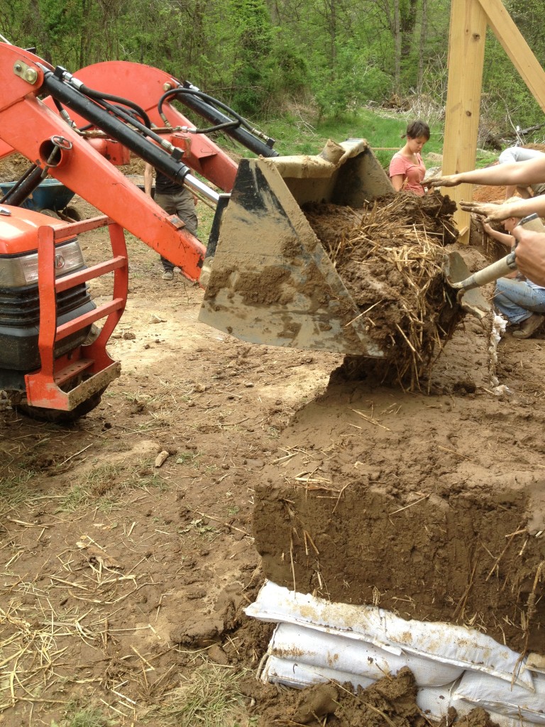 mixing cob with a tractor